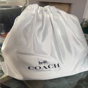 BRAND NEW Coach Kisslock clutch.